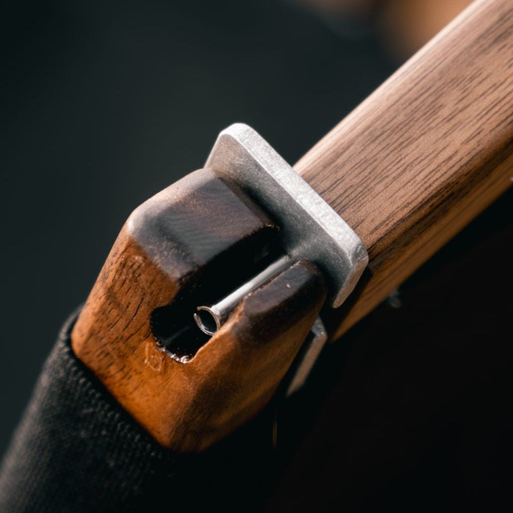 Close up of Kermit Chair attachment of curve to back rail walnut handmade furniture camping glamping made in USA aluminium hardware premium quality furniture